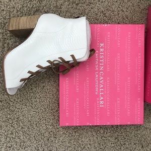 Kristin Cavallari snake embossed lace up b…